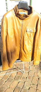 brown sheep leather jacket. L