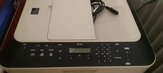 canon Printer MX320 all in one printer - in need of service R100