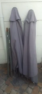 Umbrellas - patio umbrellas x 2 - in need of repair - R300 for both