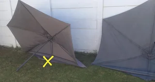 Umbrellas - patio umbrellas x 2 - in need of repair - R300 for both