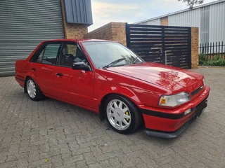 Mazda 323 Sedan (160i)