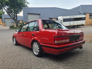 Mazda 323 Sedan (160i)
