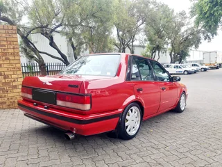 Mazda 323 Sedan (160i)