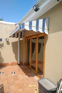 Canvas Patio roller blinds and Awnings