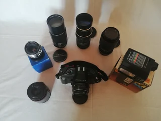 Pentax P30n Camera Plus Assorted Telephoto Lenses.