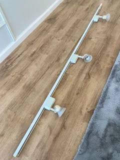 Ceiling lights security rails and book shelves