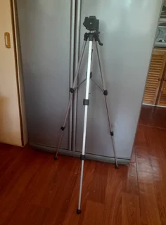 Camera fold-up tripod in bag
