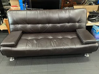 Futon Brown leather sleeper couch