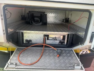 JURGENS XT 140 CAMPING TRAILER with Hydraulic Rooftop Tent.