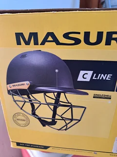 Cricket helmet/pads &amp; hockey stick