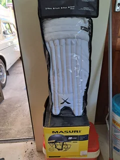 Cricket helmet/pads &amp; hockey stick