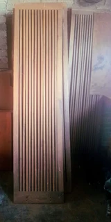 Slatted walnut panels