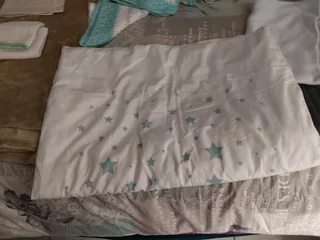 Various used and brand new baby. white and turquoise baby cot duvet and inner.