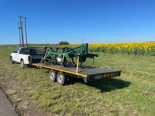 Transport with pick up and trailer