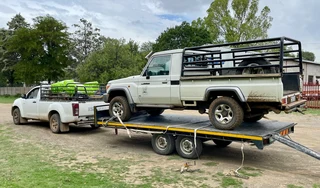 Transport with pick up and trailer