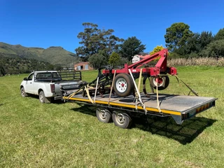 Transport with pick up and trailer