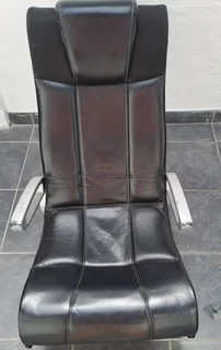 L Shape couch and a  leather rocking used arm chair .Picture was taken outside, don&#39;t hesitate .