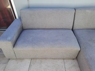 L Shape couch and a  leather rocking used arm chair .Picture was taken outside, don&#39;t hesitate .