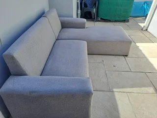 L Shape couch and a  leather rocking used arm chair .Picture was taken outside, don&#39;t hesitate .