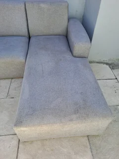 L Shape couch and a  leather rocking used arm chair .Picture was taken outside, don&#39;t hesitate .
