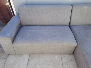 L Shape couch and a  leather rocking used arm chair .Picture was taken outside, don&#39;t hesitate .