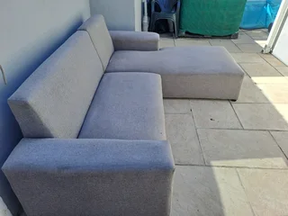L Shape couch and a  leather rocking used arm chair .Picture was taken outside, don&#39;t hesitate .
