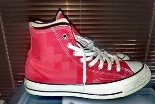 Red All Stars Converse High Top Sneaker