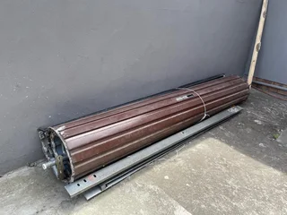 Garage roll up door and single safety gate