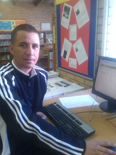 Father An Son Seeking Clothing Donations