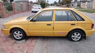 1999 Mazda 323 Hatchback - R39 950 neg