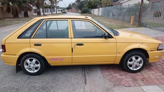 1999 Mazda 323 Hatchback - R39 950 neg