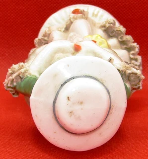 Lady with Hat and Umbrella Porcelain Figurine