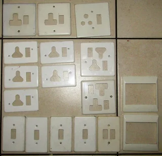 Assorted Light Switch and Plug Cover Plates and Light Switches - 26pcs used