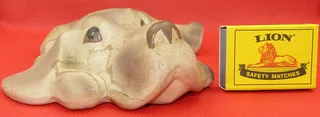 Clay Dog lying down - for your book shelf
