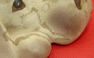 Clay Dog lying down - for your book shelf