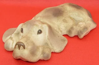 Clay Dog lying down - for your book shelf
