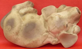 Clay Dog lying down - for your book shelf