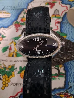 Staurino 54 authentic diamonds.