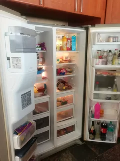 LG side by side, no frost fridge.free delivery in Cape Town.