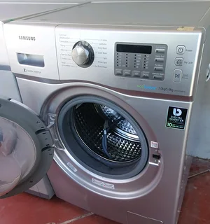 Samsung 7kg washing machine/5 kg drier front loader washing machine Working 100%Good condition