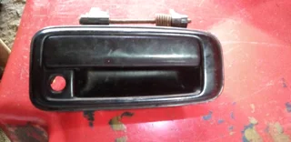 Toyota tazz or corolla driverside outter door handle available only wats in pictures original make 4