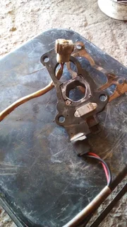 Mazda 323 carburetor base plate available original 450rand contact 0835730435