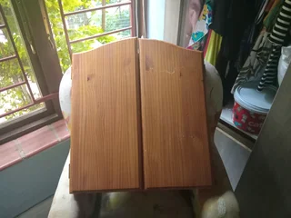 Used Dart board in wooden box