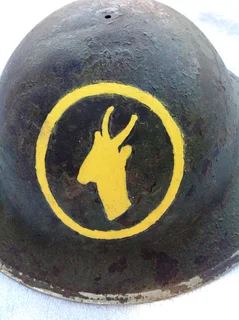 Brodie helmet featuring COPY of hand painted emblem of first South African Infantry Brigade 1916