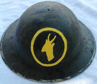 Brodie helmet featuring COPY of hand painted emblem of first South African Infantry Brigade 1916