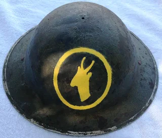 Brodie helmet featuring COPY of hand painted emblem of first South African Infantry Brigade 1916