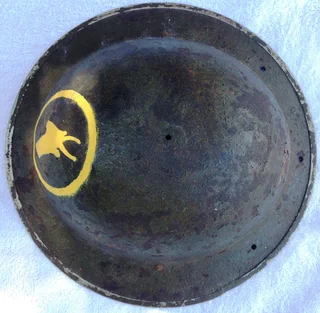 Brodie helmet featuring COPY of hand painted emblem of first South African Infantry Brigade 1916