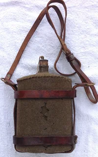 First World War British Army Cavalry felt covered metal water bottle with leather and brass harness