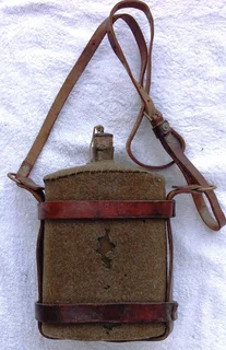 First World War British Army Cavalry felt covered metal water bottle with leather and brass harness