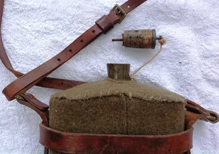 First World War British Army Cavalry felt covered metal water bottle with leather and brass harness